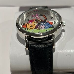 Disney Winnie the Pooh & Friends Silvertone Face Wrist Watch with Black Band.